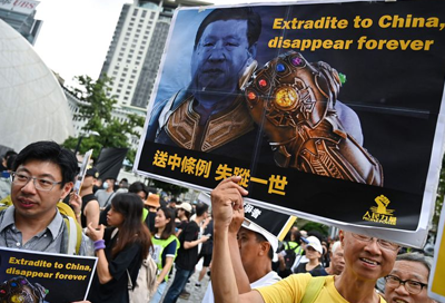 Hong Kong protesters reach out to mainland Chinese in Kowloon march